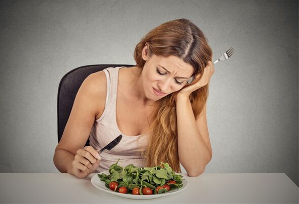 girl eats greens in mediterranean diet