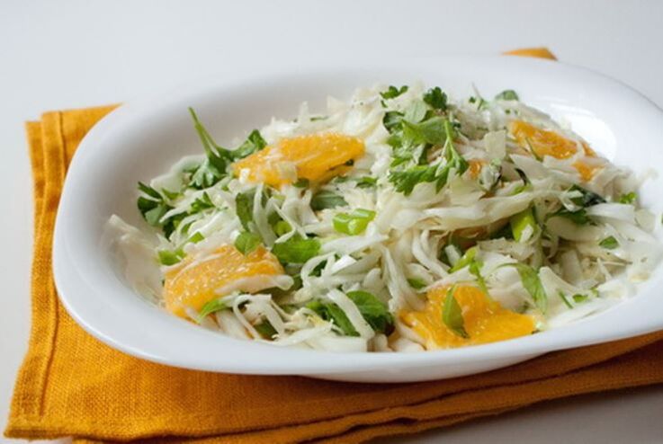 Salad with Chinese cabbage, orange and apple - a dish of vitamins in a low carb diet